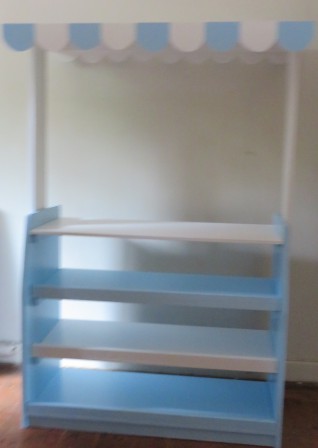 Grocery stall , pretty in pale blue and white