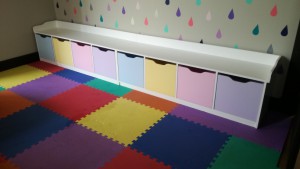 Large storage unit with pastel boxes